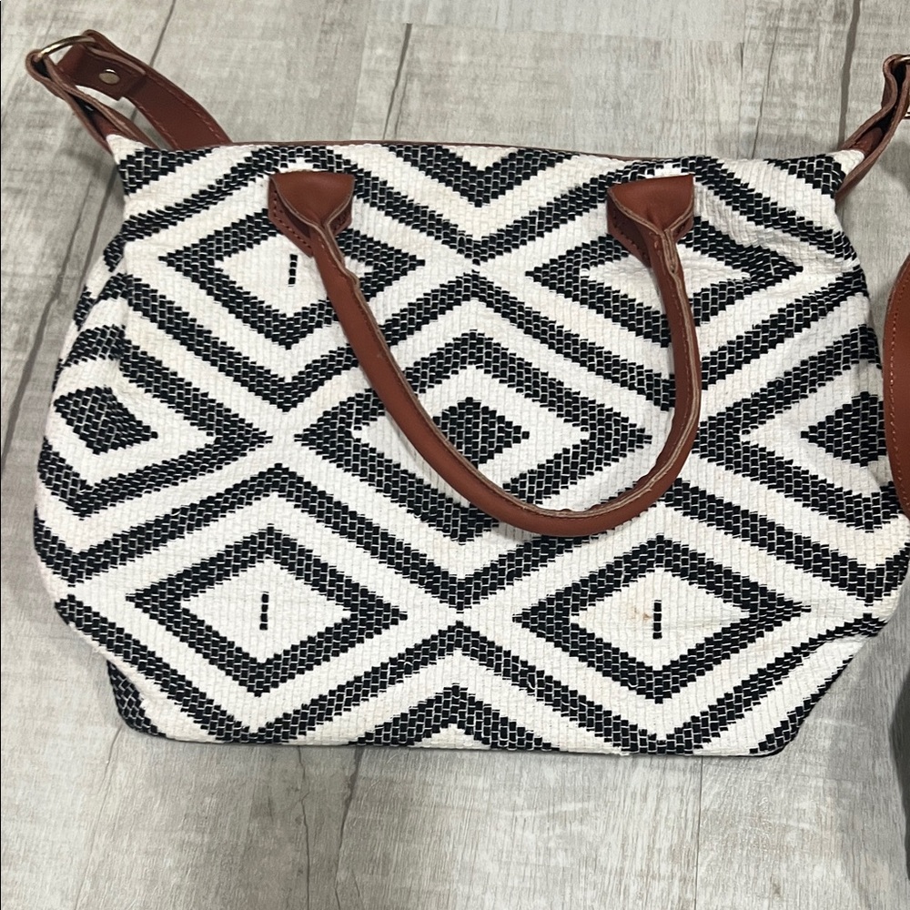 Chic Black and White Patterned Shoulder Bag with Brown Straps